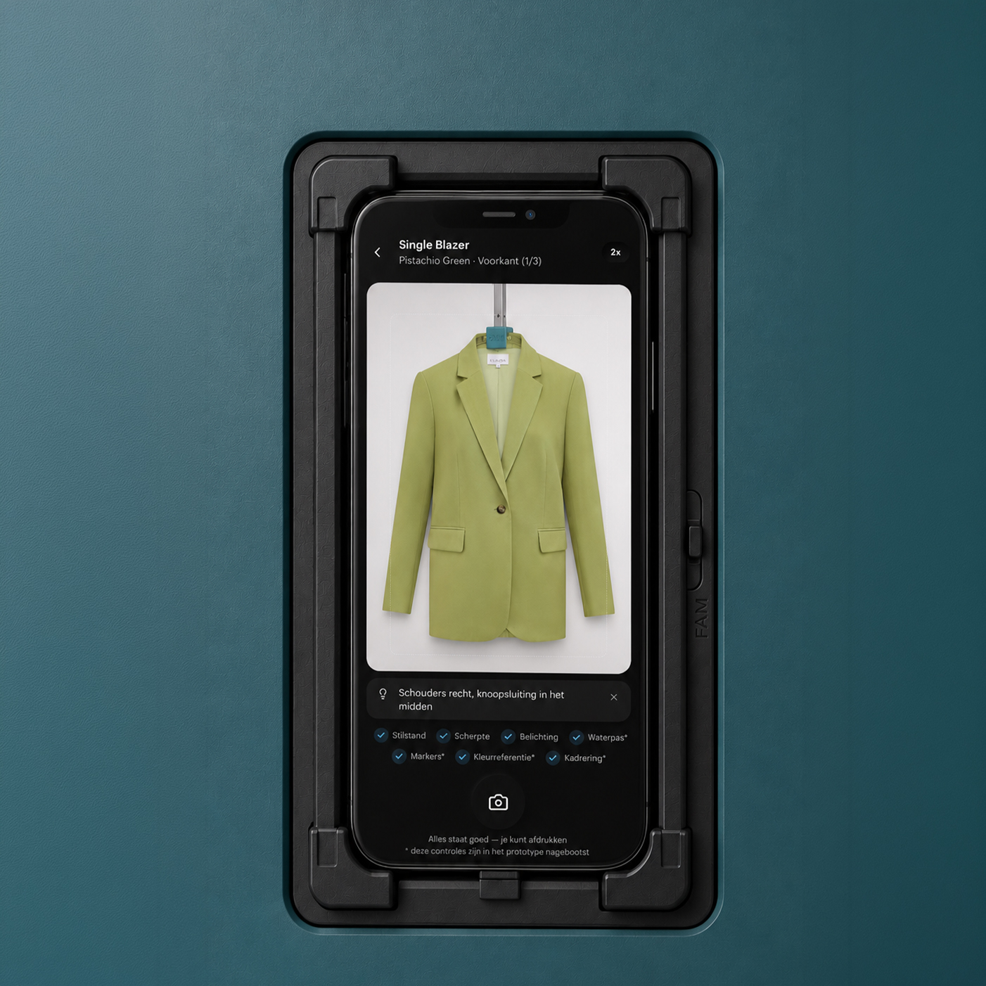 The Capture App in its fixed phone mount with the green blazer on screen